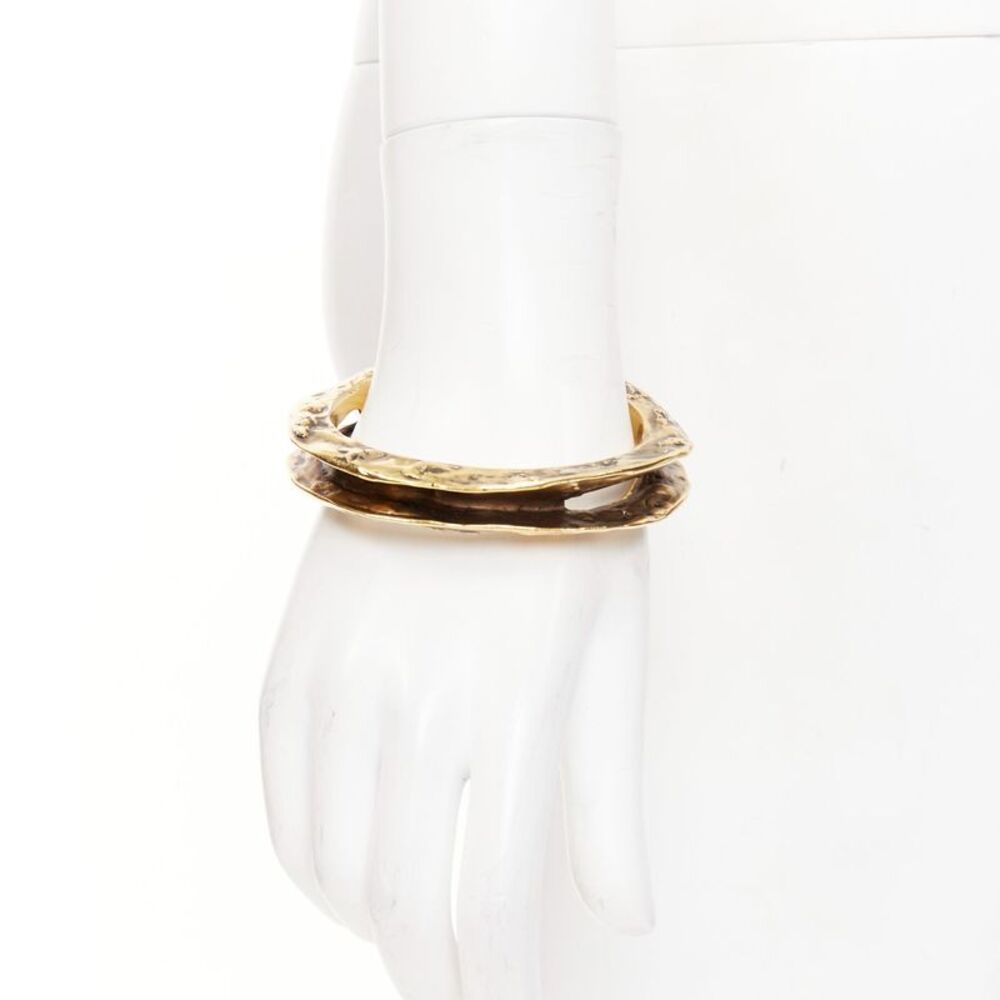 Saint Laurent antique gold tone hammered cutout cuff